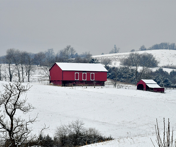 red barn snowy landscape